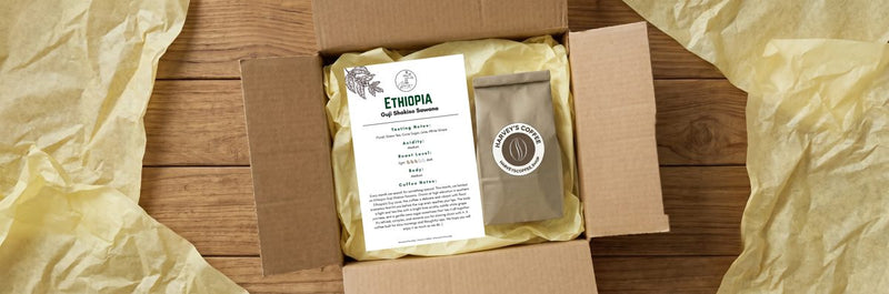 Harvey's Coffee gift box opened with a bag and tasting card
